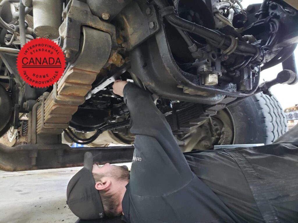 A red seal mechanic hard at work.
