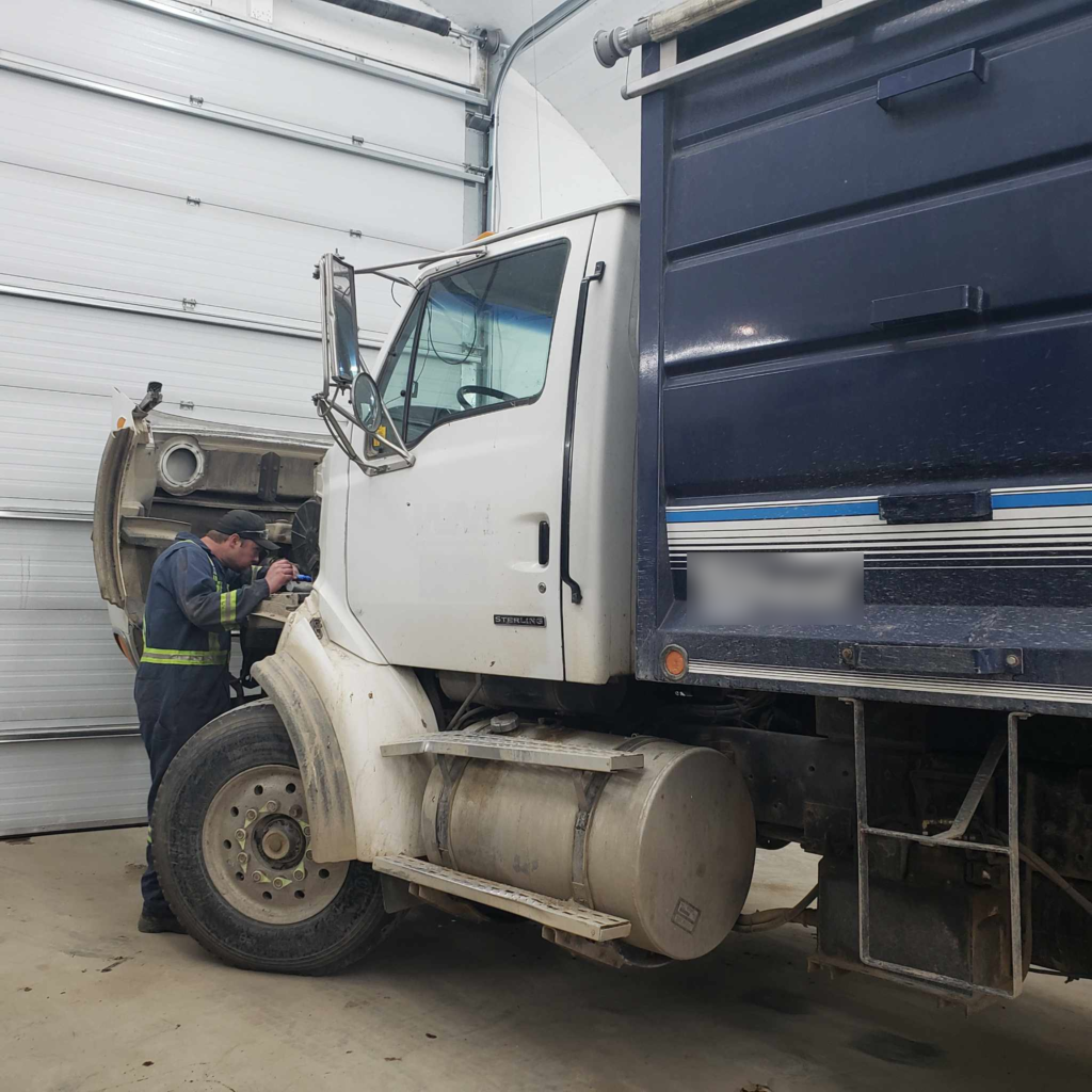 Gabriel Service and Repair Mechanic Shop Heavy Duty and Truck and Transport Mechanic Checking Oil Leak